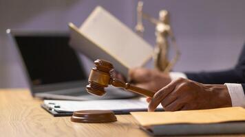 A judge gavel is prepared in the courtroom to be used to give a signal when the verdict is read after the trial is completed. Concept judge gavel is prepared to symbolize the decision in a court case. photo