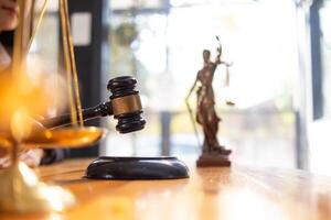 A judge gavel is prepared in the courtroom to be used to give a signal when the verdict is read after the trial is completed. Concept judge gavel is prepared to symbolize the decision in a court case. photo