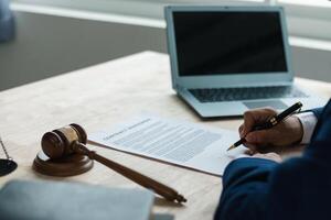 A judge gavel is prepared in the courtroom to be used to give a signal when the verdict is read after the trial is completed. Concept judge gavel is prepared to symbolize the decision in a court case. photo