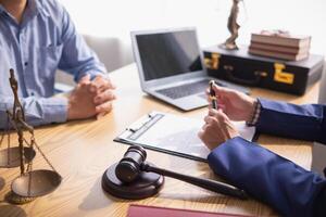 A judge gavel is prepared in the courtroom to be used to give a signal when the verdict is read after the trial is completed. Concept judge gavel is prepared to symbolize the decision in a court case. photo