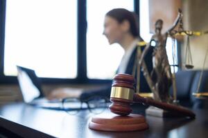 A judge gavel is prepared in the courtroom to be used to give a signal when the verdict is read after the trial is completed. Concept judge gavel is prepared to symbolize the decision in a court case. photo