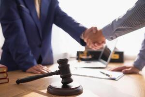 A judge gavel is prepared in the courtroom to be used to give a signal when the verdict is read after the trial is completed. Concept judge gavel is prepared to symbolize the decision in a court case. photo