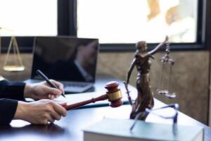 A judge gavel is prepared in the courtroom to be used to give a signal when the verdict is read after the trial is completed. Concept judge gavel is prepared to symbolize the decision in a court case. photo