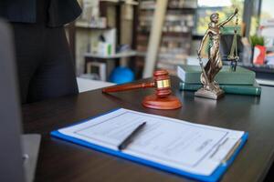 A judge gavel is prepared in the courtroom to be used to give a signal when the verdict is read after the trial is completed. Concept judge gavel is prepared to symbolize the decision in a court case. photo