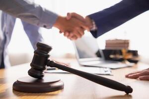 A judge gavel is prepared in the courtroom to be used to give a signal when the verdict is read after the trial is completed. Concept judge gavel is prepared to symbolize the decision in a court case. photo