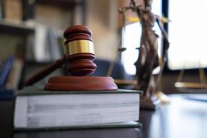 A judge gavel is prepared in the courtroom to be used to give a signal when the verdict is read after the trial is completed. Concept judge gavel is prepared to symbolize the decision in a court case. photo