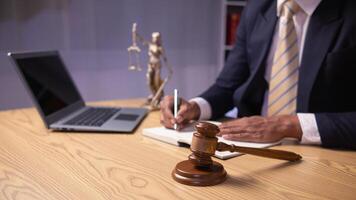 A judge gavel is prepared in the courtroom to be used to give a signal when the verdict is read after the trial is completed. Concept judge gavel is prepared to symbolize the decision in a court case. photo