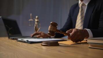 A judge gavel is prepared in the courtroom to be used to give a signal when the verdict is read after the trial is completed. Concept judge gavel is prepared to symbolize the decision in a court case. photo