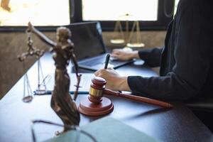 A judge gavel is prepared in the courtroom to be used to give a signal when the verdict is read after the trial is completed. Concept judge gavel is prepared to symbolize the decision in a court case. photo