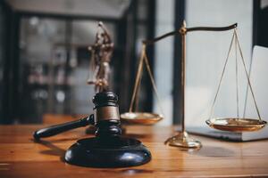 A judge gavel is prepared in the courtroom to be used to give a signal when the verdict is read after the trial is completed. Concept judge gavel is prepared to symbolize the decision in a court case. photo