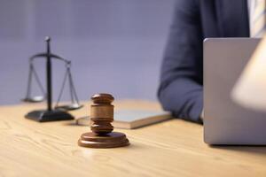 A judge gavel is prepared in the courtroom to be used to give a signal when the verdict is read after the trial is completed. Concept judge gavel is prepared to symbolize the decision in a court case. photo