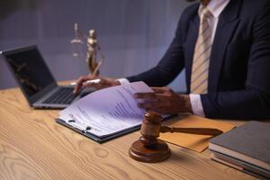 A judge gavel is prepared in the courtroom to be used to give a signal when the verdict is read after the trial is completed. Concept judge gavel is prepared to symbolize the decision in a court case. photo