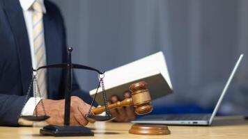 A judge gavel is prepared in the courtroom to be used to give a signal when the verdict is read after the trial is completed. Concept judge gavel is prepared to symbolize the decision in a court case. photo