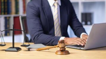 A judge gavel is prepared in the courtroom to be used to give a signal when the verdict is read after the trial is completed. Concept judge gavel is prepared to symbolize the decision in a court case. photo