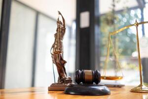 A judge gavel is prepared in the courtroom to be used to give a signal when the verdict is read after the trial is completed. Concept judge gavel is prepared to symbolize the decision in a court case. photo