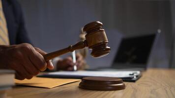 A judge gavel is prepared in the courtroom to be used to give a signal when the verdict is read after the trial is completed. Concept judge gavel is prepared to symbolize the decision in a court case. photo