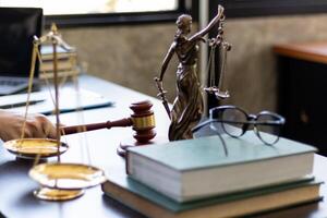 A judge gavel is prepared in the courtroom to be used to give a signal when the verdict is read after the trial is completed. Concept judge gavel is prepared to symbolize the decision in a court case. photo