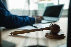 A judge gavel is prepared in the courtroom to be used to give a signal when the verdict is read after the trial is completed. Concept judge gavel is prepared to symbolize the decision in a court case. photo