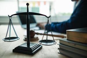 Brass scales are placed on lawyers desks in legal advice offices as a symbol of fairness and integrity in the High Court decision making. Brass scales were used as a symbol of honesty and justice. photo