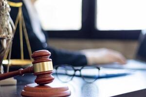 A judge gavel is prepared in the courtroom to be used to give a signal when the verdict is read after the trial is completed. Concept judge gavel is prepared to symbolize the decision in a court case. photo