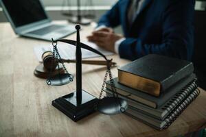 Brass scales are placed on lawyers desks in legal advice offices as a symbol of fairness and integrity in the High Court decision making. Brass scales were used as a symbol of honesty and justice. photo