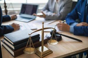 Brass scales are placed on lawyers desks in legal advice offices as a symbol of fairness and integrity in the High Court decision making. Brass scales were used as a symbol of honesty and justice. photo