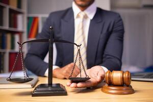 Brass scales are placed on lawyers desks in legal advice offices as a symbol of fairness and integrity in the High Court decision making. Brass scales were used as a symbol of honesty and justice. photo