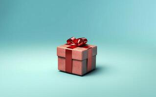 AI generated Small red present for Christmas and New Year holidays. Red gift box in glitter paper, red ribbon box on top. Light blue solid background with copy space. photo