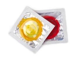 Colorful condoms isolated photo