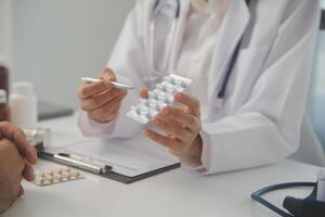 Healthcare service and pharmacy worker with customer at store counter for medication explanation. Pharmaceutical advice and opinion of pharmacist helping girl with medicine information. photo