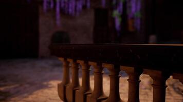 A close up of a railing with a brick building in the background video