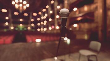 An empty stage with chairs and a microphone video