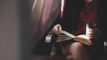 Asian young woman using laptop sitting near windows at first class on airplane during flight,Traveling and Business concept video