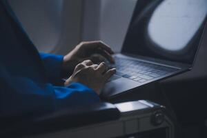 Using mobile and laptop, Thoughtful asian people female person onboard, airplane window, perfectly capture the anticipation and excitement of holiday travel. chinese, japanese people. photo