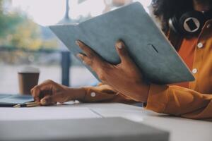 Finance manager meeting discussing company growth project success financial statistics, professional investor working start up project for strategy plan with document, laptop and digital tablet. photo