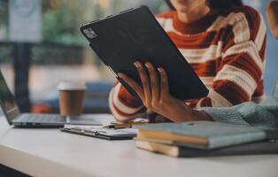 Finance manager meeting discussing company growth project success financial statistics, professional investor working start up project for strategy plan with document, laptop and digital tablet. photo