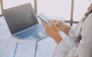 Co working conference, Business team meeting present, investor executive colleagues discussing new plan financial graph data on outdoors office table with laptop and tablet, Finance, accounting photo