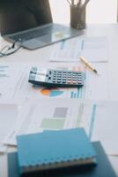 Business team collaboration discussing working analyzing with financial data and marketing growth report graph in team, presentation and brainstorming to strategy planning making profit of company. photo