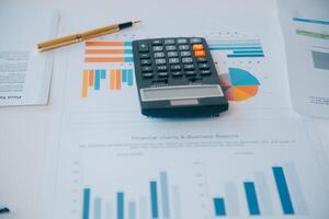 Business team collaboration discussing working analyzing with financial data and marketing growth report graph in team, presentation and brainstorming to strategy planning making profit of company. photo