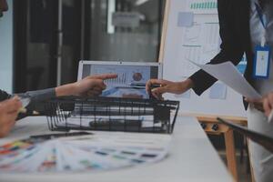 Close up ux developer and ui designer use augmented reality brainstorming about mobile app interface wireframe design on desk at modern office.Creative digital development agency photo