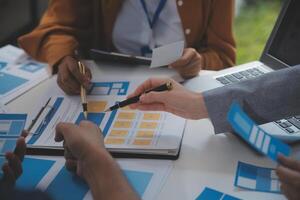 Close up ux developer and ui designer use augmented reality brainstorming about mobile app interface wireframe design on desk at modern office.Creative digital development agency photo