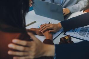 Businessman and lawyer discuss the contract document. Treaty of the law. Sign a contract business. photo