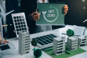 Carbon offset price report CO2 emission. Future growth Net zero waste in ESG ethical SME office protect climate change global warming social issues project. Group of asia people Eco friendly SDGs plan photo