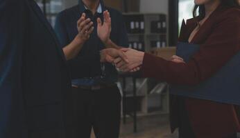 Business handshake for teamwork of business merger and acquisition,successful negotiate,hand shake,two businessman shake hand with partner to celebration partnership and business deal concept photo