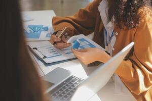 Close up ux developer and ui designer use augmented reality brainstorming about mobile app interface wireframe design on desk at modern office.Creative digital development agency photo