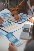 Close up ux developer and ui designer use augmented reality brainstorming about mobile app interface wireframe design on desk at modern office.Creative digital development agency photo