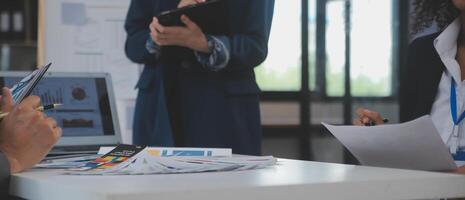 Close up ux developer and ui designer use augmented reality brainstorming about mobile app interface wireframe design on desk at modern office.Creative digital development agency photo