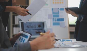 Close up ux developer and ui designer use augmented reality brainstorming about mobile app interface wireframe design on desk at modern office.Creative digital development agency photo