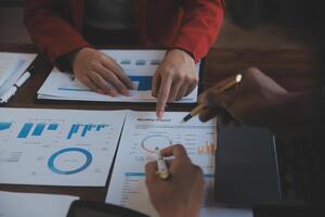 Finance manager meeting discussing company growth project success financial statistics, professional investor working start up project for strategy plan with document, laptop and digital tablet. photo