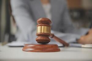 Lawyer, legal advisor, businessman brainstorming information on agreement details Business contracts in legal processing books for accuracy in contract documents. joint financial investment. photo